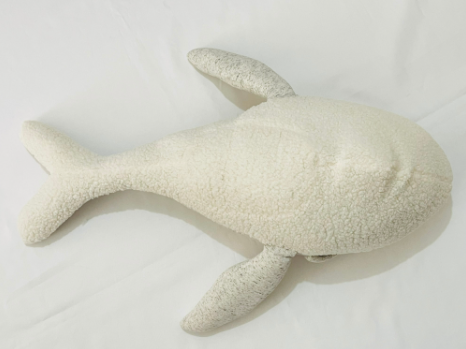 big stuffed whale underneath belly