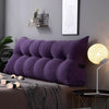 big thick headboard pillow in purple color with phone pocket on side