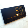 gold and black address sign modern