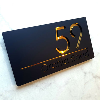 gold and black address sign modern