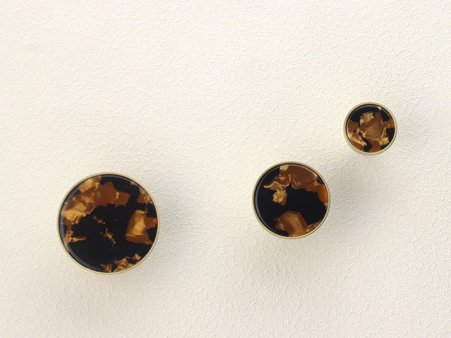 black and brown stone brass handles and hooks