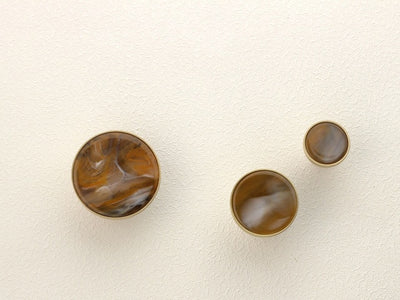 brown and orange stone brass handles and hooks
