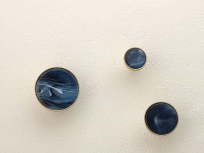 blue marble look stone brass handles and hooks