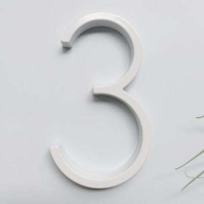 white house numbers, white street address sign, modern white slim house numbers, number 3 three white