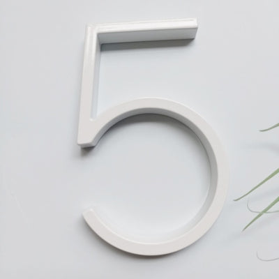 white house numbers, white street address sign, modern white slim house numbers, number 5 five white