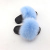 light blue kids fox fur slides slippers with black rubber soles